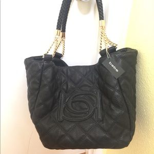 bebe Faux Leather Bucket bag NWT defects